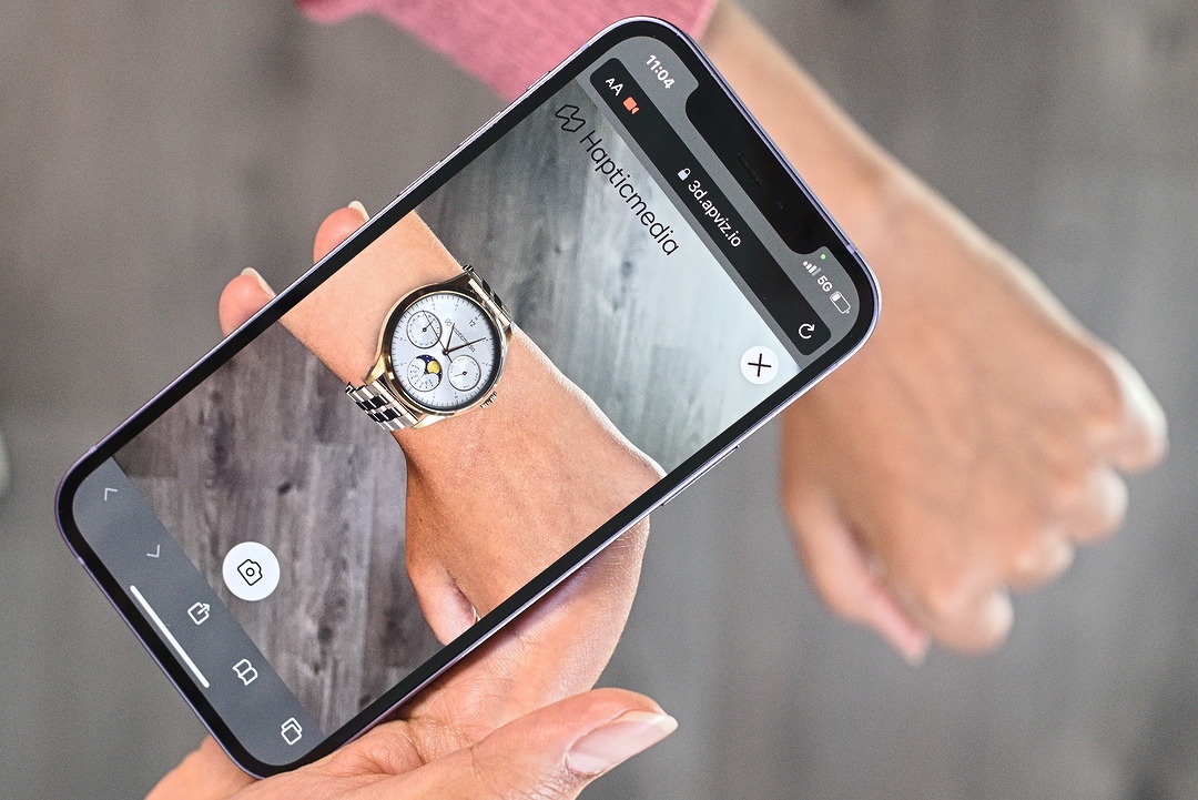 Photo of a phone virtually trying on a watch