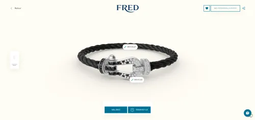 A Fred bracelet with a white gold buckle paved with black and white diamonds