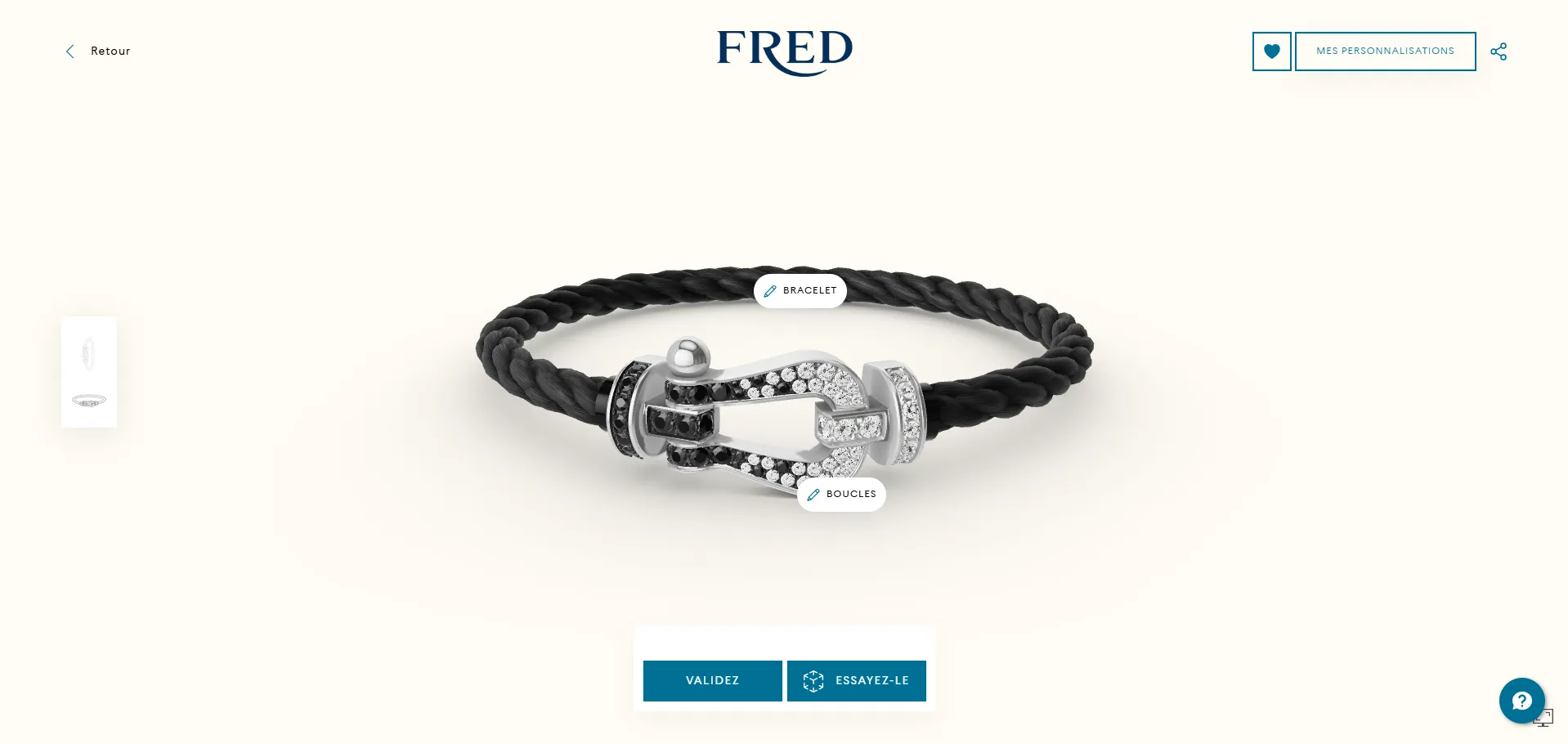 Un bracelet Fred avec une boucle en or blanc pavé de diamants noirs et blancs